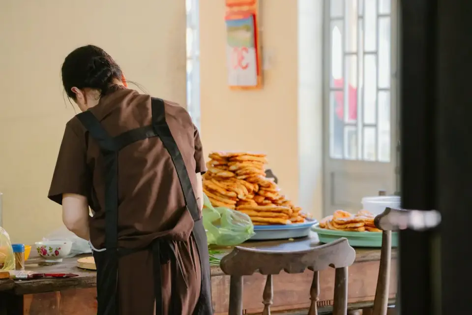 Dog owner preparing a meal