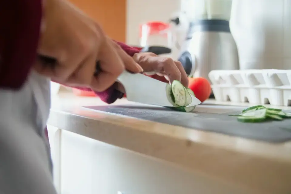 Dog owner preparing a meal